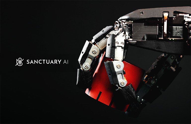 Une main robotique de Sanctuary Ai tenant un objet rouge.